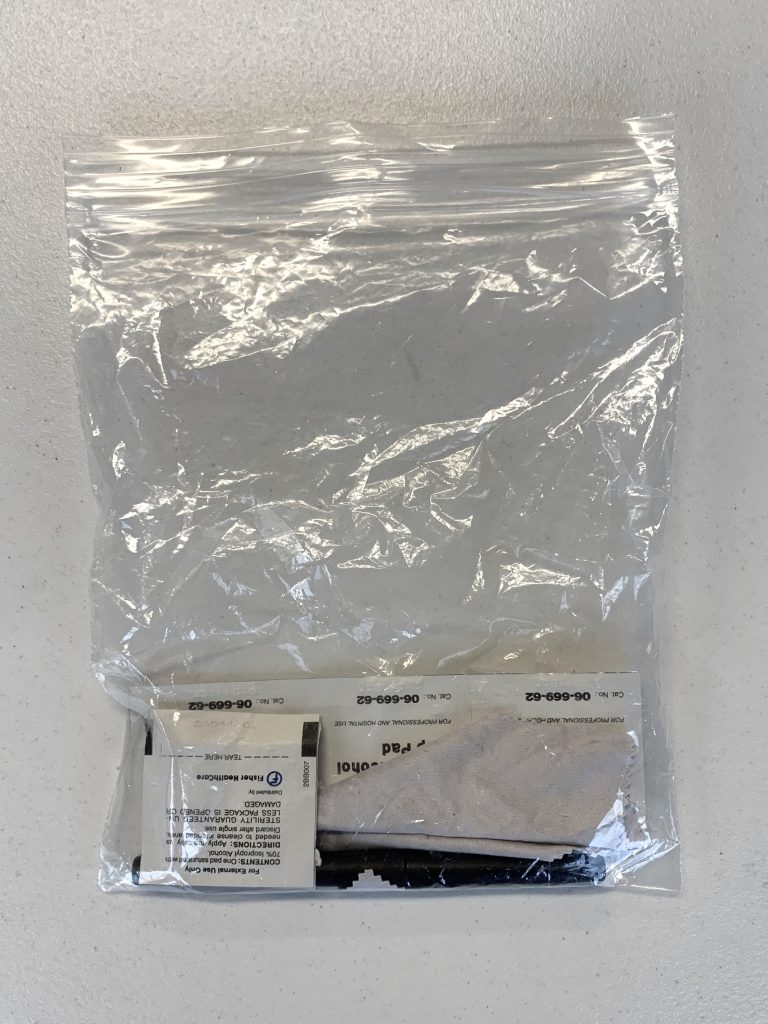 A ziploc bag containing miscellaneous items in the How We Perceive Color kit.