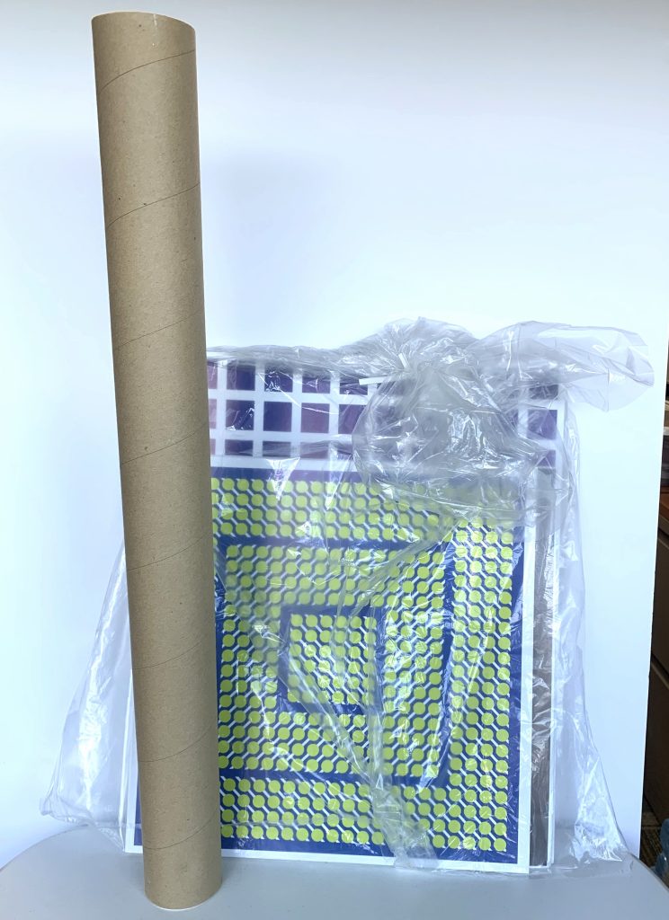 Poster tube and illusions printed on rigid core boards wrapped in a protective plastic bag. Part of the How we perceive colors station kit.