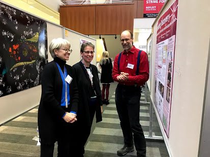 Attendees at the Poster Session