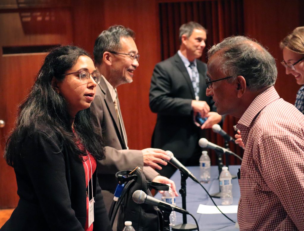 Panelists from the Trout AMD Event and Inaugural Sandra Lemke Trout Lecture talking with the audience after the event.