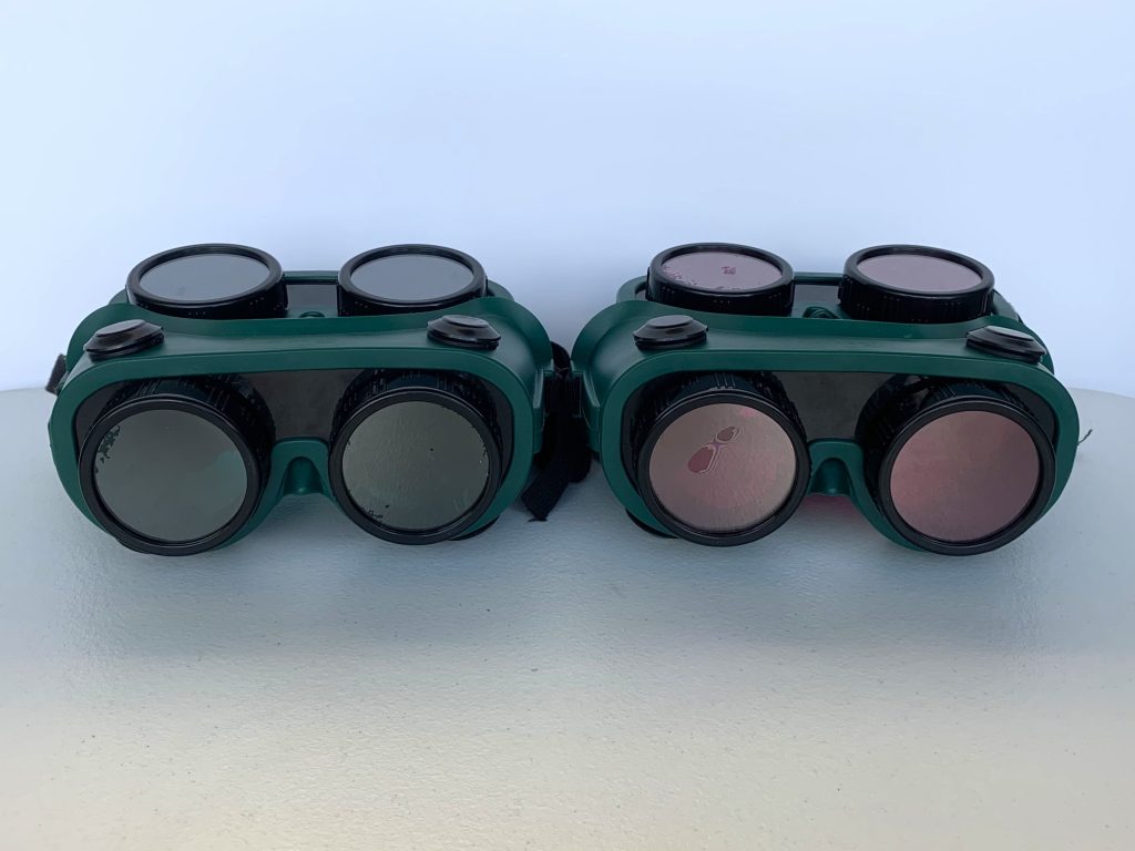 Goggles tinted green and red that are part of the How we Perceive Color Kit.