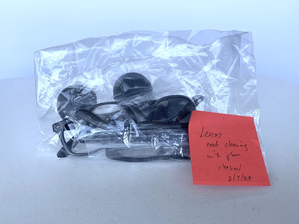 A bag of lenses for use in demonstrating the Pulfrich Phenomenon.