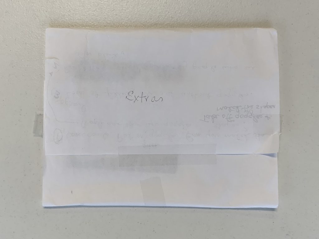 An envelope containing misc. loose items in the How We Perceive Color kit.